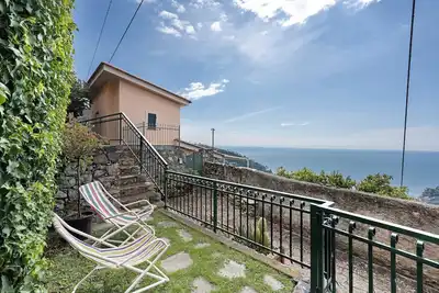Image de Appartement \"Costella\" avec vue sur mer et jardin privé