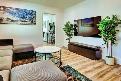 Image de 12 Min to Beach • Epic Game Room • Private Fenced Yard • Perfect for Families