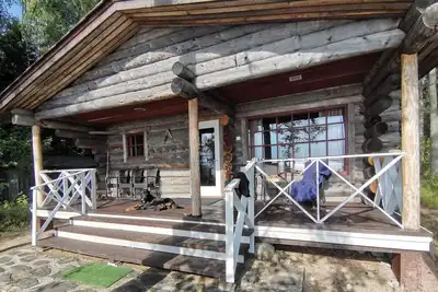 Image de A sunny, vintage villa with private sandy beach and breathtaking lake views