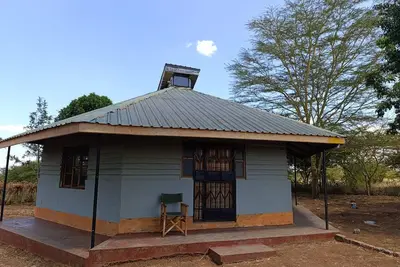 Image de Cozy cabin at the foot of the Kilimanjaro with modern amenities and wifi