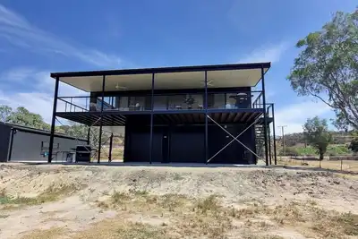 Image de Large home on the water with boat ramp and jetty