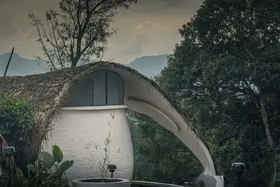 Image de Cozy 2-bedroom cabin in Wayanad, built sustainably amidst lush greener \n\n