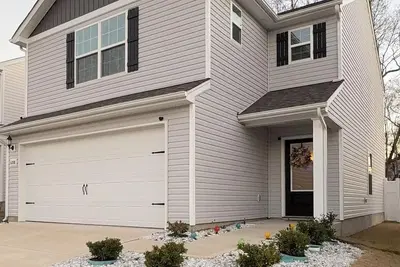 Image de Charming 3-bedroom house in Charlotte with WiFi and Ac