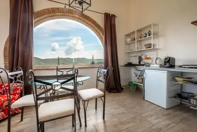 Image de Appartement \"Tamerice\" avec piscine partagée, Wi-Fi et climatisation