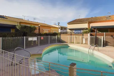 Image de Appartement 2 Pièces Rdc avec Terrasse et Parking dans Résidence Sécurisée avec Piscine