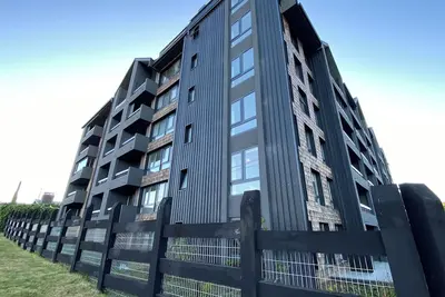 Coastal apartment with lake view, heated swimming pool and jacuzzi