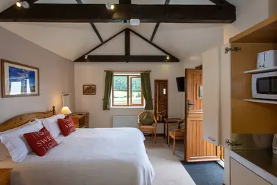 Image de Gowland Studio Room -  a room with hideaway kitchen / bathroom