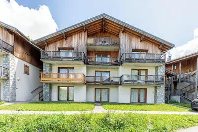 Image de Appartement 'La Montagne' avec vue sur les montagnes, piscine partagée et Wi-Fi