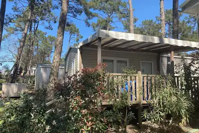 Image de Mh tout confort avec vue forêt, mer à 10 mn en voiture, petit animal accepté.