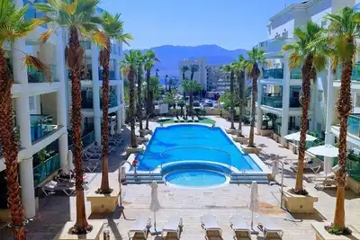 Image de located in a luxurious complex with a pool, a 4-minute walk from the beach,