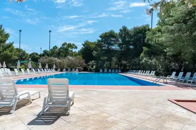 Image de Appartement 'La Casa Di Bebe' avec piscine partagée, Wi-Fi et climatisation