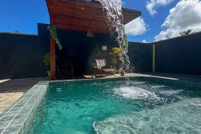 Image de House with sea view and pool in Milagres
