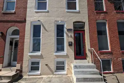 Image de Charming 3-bedroom townhome with Ac, fitness room in Hampden near Jhu-Mica-Lum