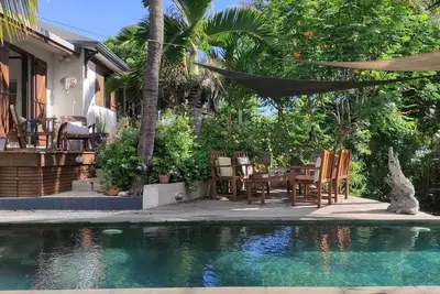 Image de Villa créole à 5 minutes à pieds de la plage, dans un grand jardin tropical