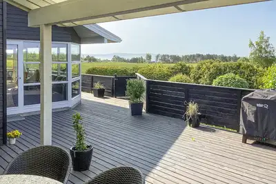 Image de Belle maison à Knebel avec sauna