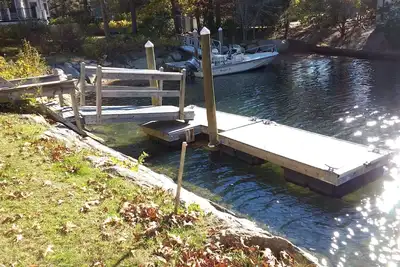 Image de Waterfront 4 Bedroom house with dock on Popponesset Island in New Seabury.