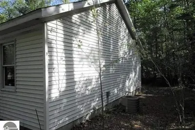 Image de Home and wooded 10 acres!