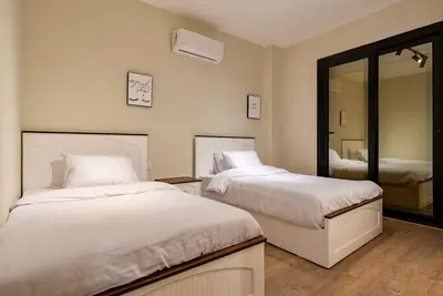 Image de luxury 3-bedroom with private garden, shared pools in midtown compound, New Cairo