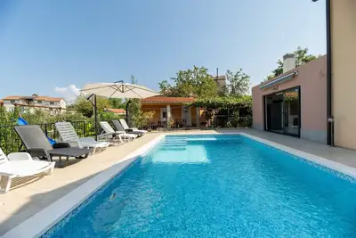 Image de Two Charming 3-bedroom cottage with\nPrivate pool and outside kitchen with grill.