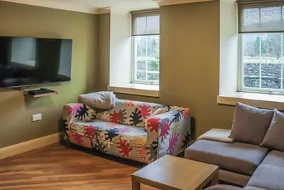 Image de A welcoming family cottage in Morfa Bychan, just a short walk to Black Rock Sands beach.