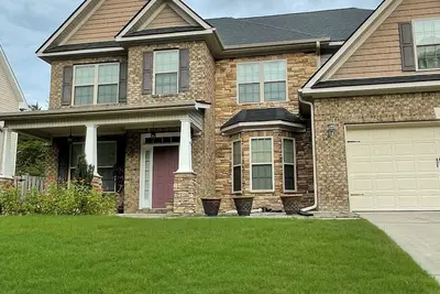 Image de Spacious 4-bedroom house with neighborhood pool