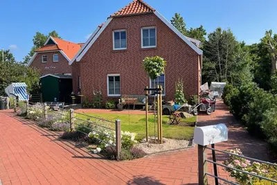 Image de Appartement 'Inselhuuske I I' avec terrasse privée, jardin privé et Wi-Fi
