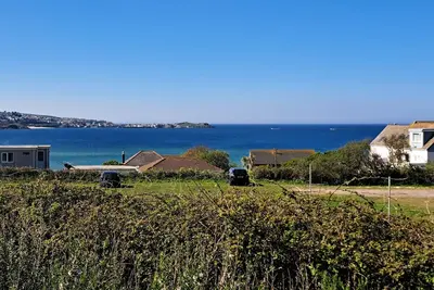 Image de Branksome enjoys lovely sea views from its enclosed deck and also has front and rear gardens.