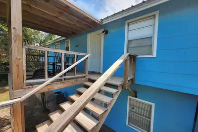 4 bedroom house walking distance to the lake, with 3 kayaks and a game garage.