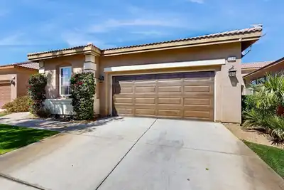 Dog-friendly golf course-adjacent home with a private pool, pool spa, & Ac