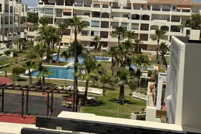 Image de Bel appartement de 2 chambres et 2 salles de bains avec plusieurs piscines