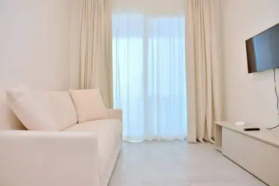 Image de Appartement élégant avec vue sur la mer et terrasse privée