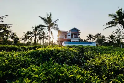 Image de 3 Bhk villa in wonderful Mananthavady with WiFi, Ac and infinity swimming pool.