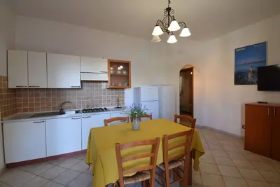 Image de Confortable appartement pour 4 personnes avec Wifi, piscine, Tv et patio, près de Castelsardo