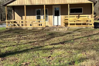 Image de 3 bedroom cabin in Combs Ar Mill Creek Rd. Closest rental to the Trailhead.