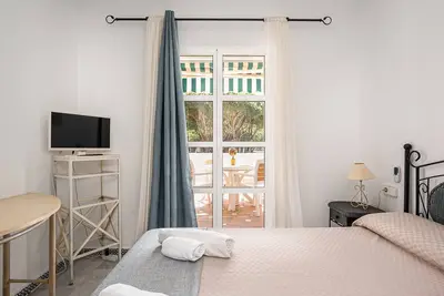 Image de Appartement 'En Pueblo Marinero' avec piscine partagée, Wi-Fi et climatisation