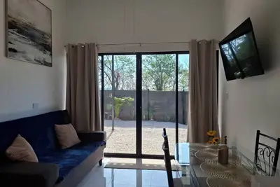 Image de Charming 2-bedroom house with WiFi, Ac in soothing Tempate.