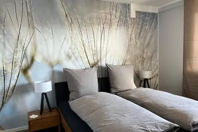 Image de Appartement 'Pusteblume, 70 Qm' avec terrasse privée, jardin partagé et Wi-Fi