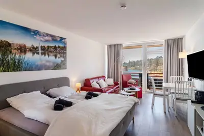 Image de Appartement \"Eure Auszeit\" avec vue sur le lac, jardin partagé et Wi-Fi