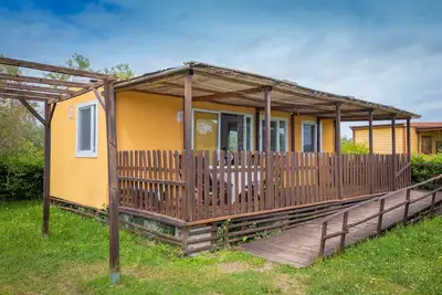 Image de Bungalow \"Sole2\" avec piscine partagée, terrasse privée et climatisation