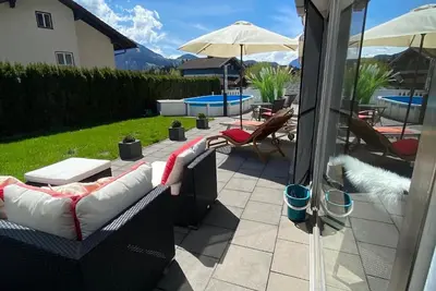 Image de Appartement \"Modernes Alpenapartment\" avec vue sur les montagnes, piscine privée et Wi-Fi