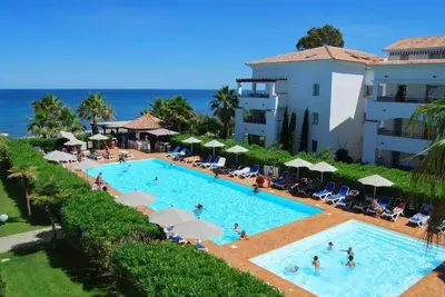 Image de Appartement dans résidence piscine et plage privée