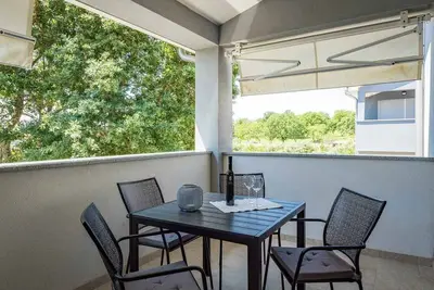 Image de Appartement de vacances avec climatisation et balcon