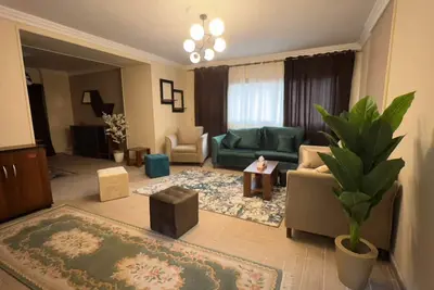 Image de A cozy apartment and a great location in the golden square in Nasr city.