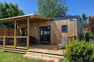 Image de Homeflower premium 29m² (2 chambres) + Clim + terrasse semi-couverte + Tv + draps + serviettes 4 personnes