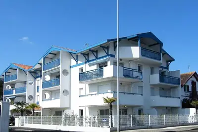 Image de Résidence Le Magellan. Appartement en rez-de-chaussée pour 4 personnes proche au port de pêche.