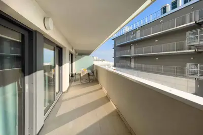 Appartement de vacances avec climatisation et balcon avec vue sur la lagune