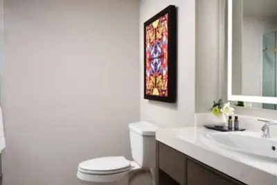 Image de Modern Cancun resort with comfy home feel at the edge of beach and pool living.