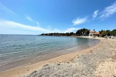 Image de Appartement classé 4 étoiles en bord de mer avec vue et piscine
