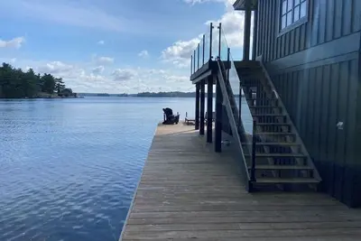 Image de Lake Joseph Luxury Rental with 2-story Boathouse. Tennis & Pickleball Optional.