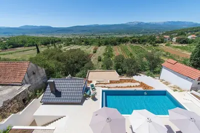 Image de Maison de vacances Imotski pour 1 - 6 personnes avec 2 chambres Ă coucher - Maison de vacances